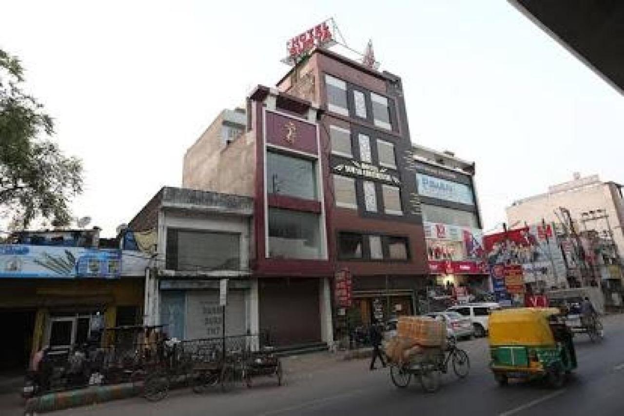 Capital O Hotel Surya Continental Lucknow Buitenkant foto